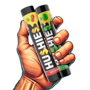 A hand holding two cans of hushie.